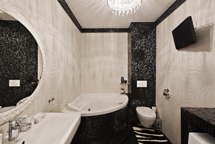 Дизайн ванной комнаты с угловой ванной — фото интерьера
